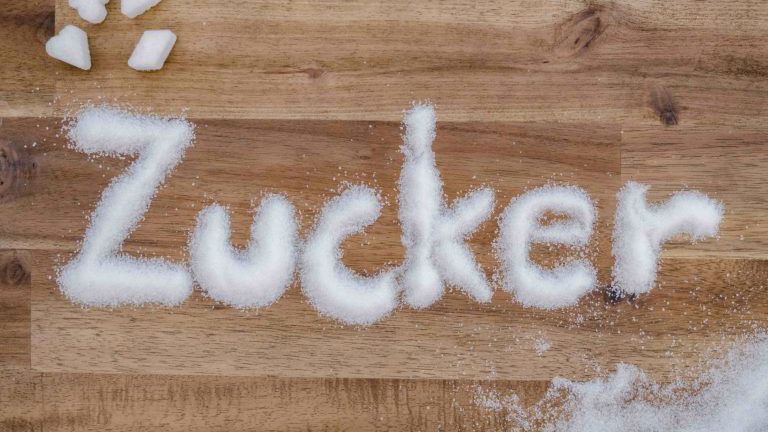 Zucker geschrieben auf Holz