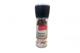 Natursalz mit Tomatenflocken in der Mühle