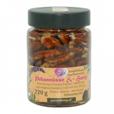 Akazienhonig mit Pekannüssen ist eine köstliche Kombination aus dem milden, süßen Geschmack von Akazienhonig und dem buttrigen, nussigen Aroma von Pekannüssen. 